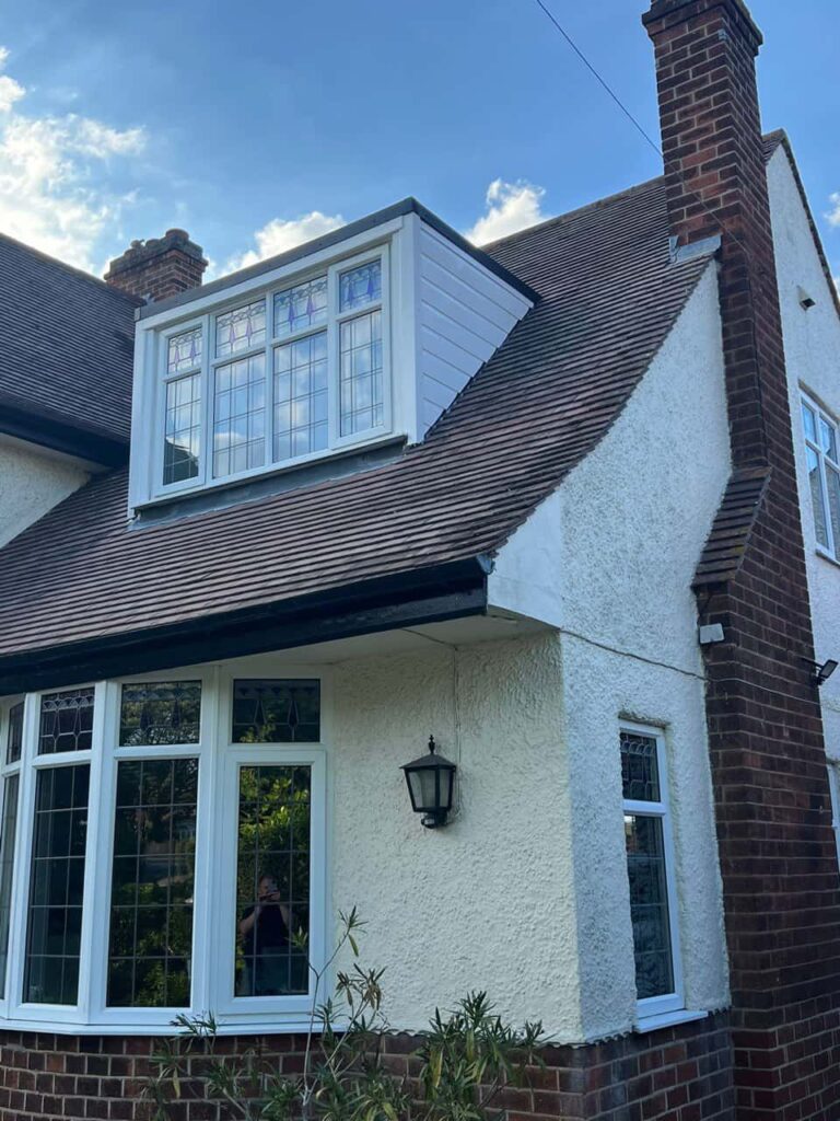 This is a photo of a dormer window which has just had some repairs carried out where the roof and the dormer meet. Works carried out by Caterham Roofing Repairs